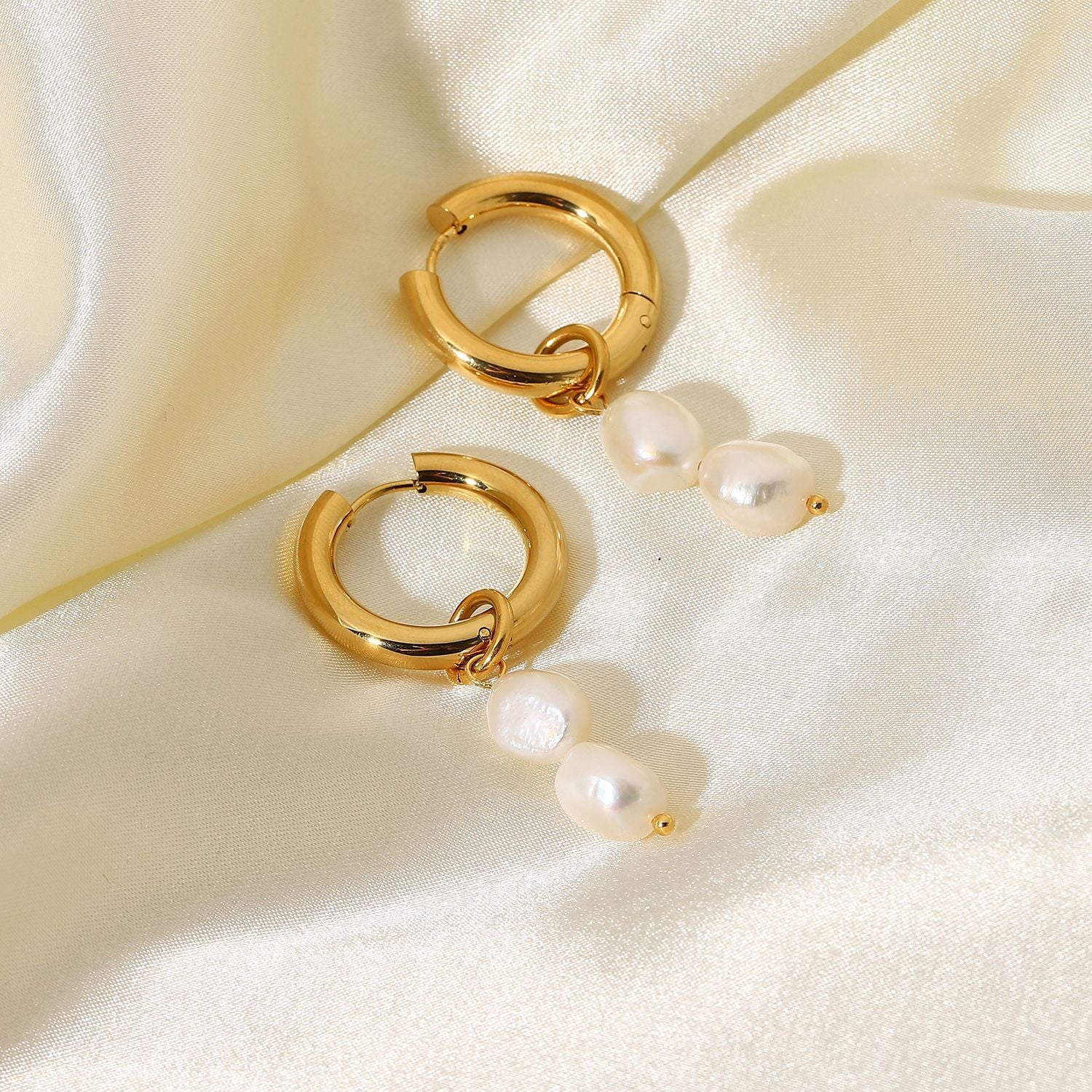 Sophisticated fresh pearl drop hoop earrings, perfect for gifting to women who love elegant jewelry.